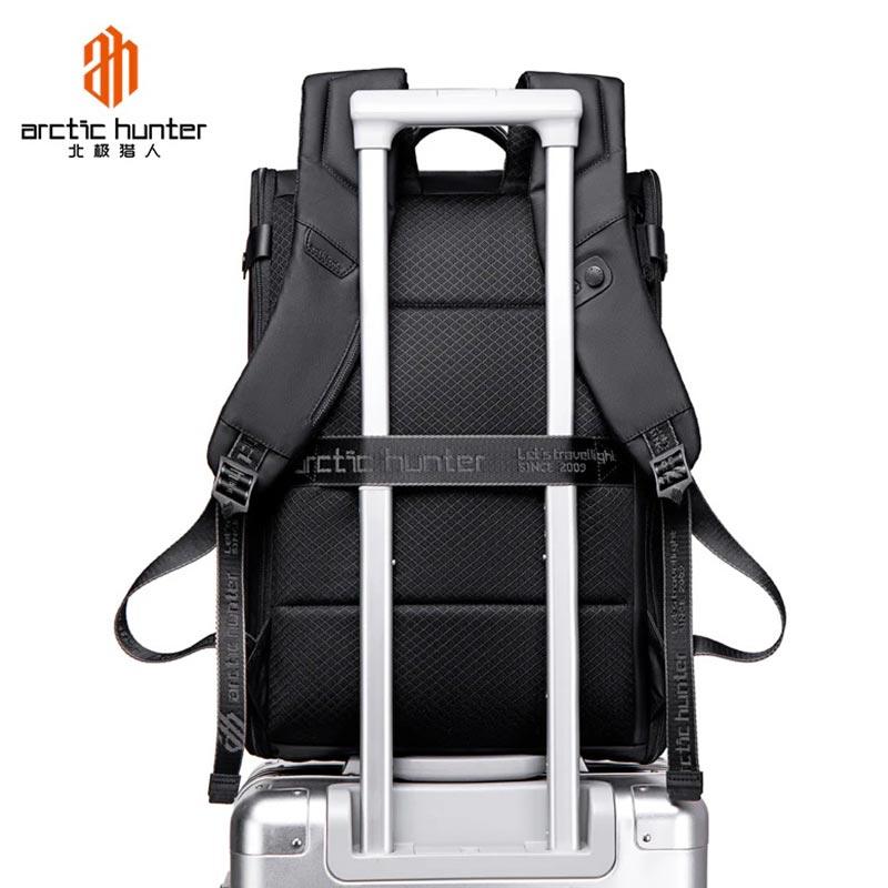 Arctic Hunter 15.6-Inch Laptop Backpack Waterproof Business Casual Travel Backpack for Men Women B00465 Black Back view on trolley carrier